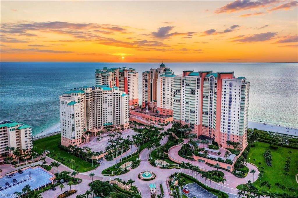 Set directly on the sand within prestigious Cape Marco, this exceptional Cozumel residence delivers the beachfront condo lifestyle at the highest level for those who value elegance and privacy. Sweeping Gulf views stretch across Marco Island’s white sand shoreline from your private balcony, creating a dramatic backdrop and breathtaking sunsets from nearly every main living space with a full 4 mile view of Marco's crescent beach and the Gulf beyond. Offering 3 Bedrooms | 3 Baths, two deeded parking spaces and a dedicated storage room, the residence blends timeless luxury with effortless coastal sophistication through marble flooring, crown molding, custom built-ins, expansive floor to ceiling glass doors, and beautifully scaled interiors designed for both entertaining and everyday living. The eat-in chef’s kitchen features new Quartz Countertops throughout and is perfectly positioned to capture stunning beach and Gulf views, while the spacious primary suite opens directly to a private terrace and features oversized walk-in closets and a luxe spa-style bath. 2 more split bedrooms are ensuite sharing a private balcony, creating a true resort-style experience for family and guests alike. Cozumel at Cape Marco is one of Marco Island’s most exclusive beachfront addresses, offering residents a gated luxury lifestyle with direct beach access, beachfront pool and spa, fitness center with Gulf views, Har-Tru tennis courts, elegant social spaces, and beautifully maintained club house and grounds — all moments from the island’s finest dining, yacht clubs, and waterfront experiences. Front-row beachfront living. Privacy. Prestige. Rarely available.