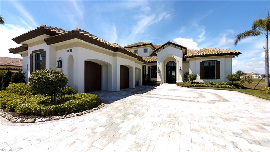 "Luxury Living at its Finest". Rare opportunity to own newly constructed 5100 sqft., 5 bedroom home with 6 full baths plus upstairs bonus room with custom built-in trundle beds. One of the best water & golf course views in sought-after Talis Park. Large circular drive for ample parking & ease. Light-filled Great Room with 16’foot ceilings. Custom features, furnishings, top quality craftsmanship. Tone-on-tone coastal elegance & soft clean lines. Modern wood-look porcelain tile & (2nd floor) wood floors. Designer features, gourmet kitchen, 2 center islands, state-of-the-art appliances, full-wall backsplash, breakfast nook. Nearly 2600 square feet of elegant outdoor living, infinity edge pool/spa, outdoor kitchen, bar island, floor-to-ceiling fireplace with built in TV.  Master bedroom retreat with 14’ ceilings, spectacular master bath, dual walk in shower, soaking tub. Custom built-ins and closet systems throughout.  Sophisticated study for “Him” and additional office area for "Her." Beautifully furnished with custom window treatments throughout.