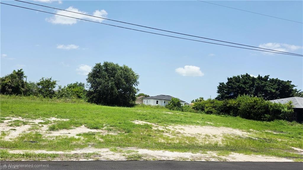 WATER AND SEWER AVAILABLE!! Build your dream home on this well-located residential lot in the growing Northeast Cape Coral area, providing space for a custom home, pool, and outdoor living. Conveniently located near schools, shopping, dining, and with easy access to major roads. Enjoy a peaceful neighborhood setting with new construction homes nearby. No HOA restrictions, making it a great opportunity for homeowners or investors looking to build in a rapidly developing area.
