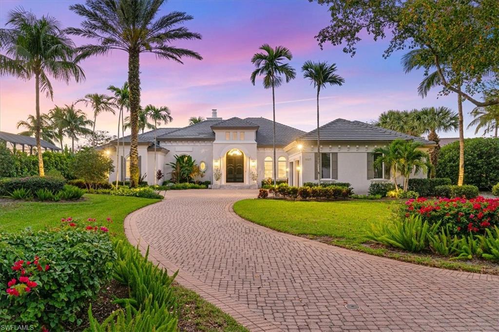 Impeccably remodeled luxury estate home at the prestigious Grey Oaks. Situated on a highly coveted lot with southwestern rear exposure. Experience stunning views of the water and 13th fairway of the Palm Golf Course from the backyard oasis and nearly every room! The grand entrance welcomes you into this Coastal Contemporary style home with its high ceilings, custom millwork and large windows that provide fantastic natural lighting. Boasting 5,600 square feet of living space, 4 bedrooms, 5 full bathrooms, 2 half bathrooms, an office/den, gourmet kitchen, living room, family room, formal dining room and a 3-car garage. Complete with a new roof, new tankless water heater, new whole house water filtration and high-end appliances. The expansive sliding doors open to the serene out door space. Outfitted with a heated pool, spa, large covered lanai, fireplace and outdoor kitchen. Grey Oaks is an exclusive private country club with world-class amenities. Including 3 golf courses, a wellness center, resort-style pool, spa, tennis, pickle ball, 3 dining venues, and 2 clubhouses. All within minutes to Naples finest shops, dining, beaches, schools and entertainment!
