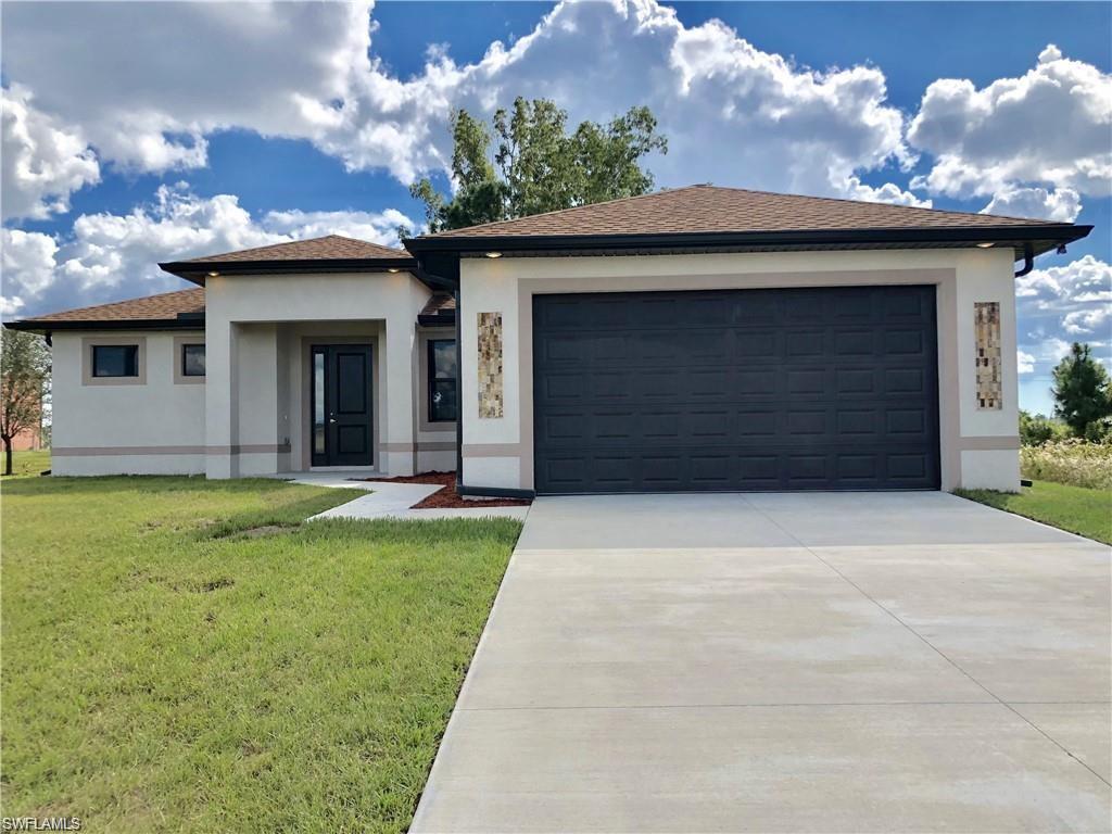 LOCATION!!! Beautiful Single Family Home, Built-in 2018 in SW Lehigh Acres,. 3 bedrooms, 2 baths, 2 car garage. 1592 living area, 2395 total. Tile flooring throughout, granite counter tops in kitchen and baths, shaker style cabinets, dual sinks in master bath, walk-in master closet, impact windows and doors, sliding door, with a screened lanai and room for a pool. Close to the recently-widened Highway 82 allows for a relaxed commute to Fort Myers, Bonita Springs, Immokalee, and Labelle. Approximately 15 minutes to SR-80 with quick access to the city of Alva. Just 18-20 minutes to Fenway South, SWFL International Airport, Minnesota Twins Stadium and many other locations.