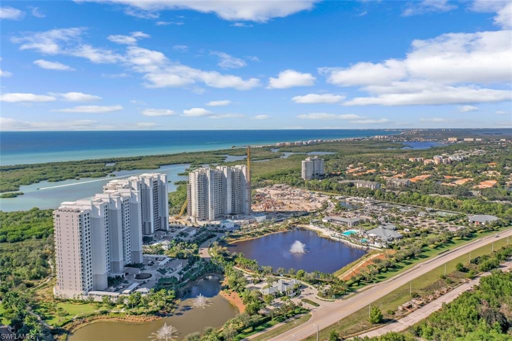 Don't miss out on this rarely available south, end unit with stunning sunsets all year long.  Sleek, light and bright with full length windows in every room.  New updated gorgeous custom matching, lighted built-ins in the office, living room and bedrooms. Beautiful imported sealed wood flooring in the main living areas and bedrooms.  Bright white tile and cabinetry in all baths. Kalea Bay is an amenity rich community featuring 3 swimming pools, restaurants, tennis, pickle ball and guest cottages as well as optional beach and restaurant access at Moraya Bay.  Building also has rooftop amenities with exercise facility, sundeck and pool.  Absolutely stunning views!