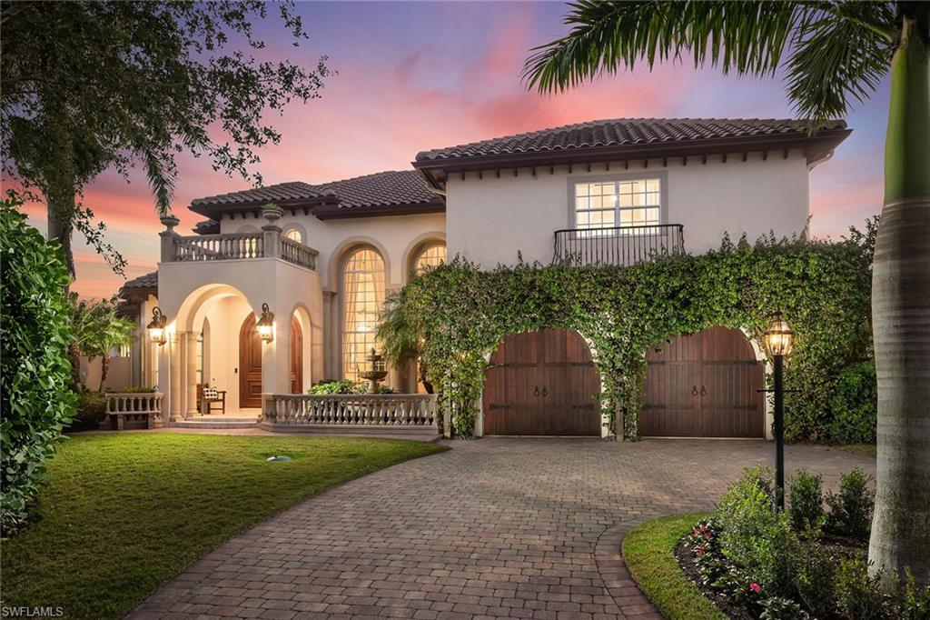Magnificent estate home with exquisite architecture and unparalleled quality on a prime cul-de-sac lot with southwestern wraparound lake views. Magical outdoor space on sprawling lanai with stone deck, summer kitchen, charming stone fire pit, arbor sitting area and wood ceilings. Stunning natural stone flooring throughout 1st floor, hand-carved marble fireplace, columns & hand-carved natural sandstone fountain. State-of-the-art finishes to baths, kitchen and laundry room from recent renovation include fabulous marble waterjet mosiac, white Thassos marble, pure white glass tile, and Italian porcelain with white Thassos marble accents. Sprawling space perfect for a large family; spa-like master suite, study, two en-suite guestrooms downstairs, huge media room and two guestrooms upstairs. Spectacular renovated cook’s kitchen with gleaming quartz, Viking double oven, 5-burner gas stove open to spacious sundrenched dining & family room with 10-foot zero-edge pocket sliders. Features include 20-foot ceilings, dramatic 14-foot windows, 10-foot mahogany front doors, tankless hot water heater, Allani whole-house filtration, 100-bottle wine room, well irrigation, Zoysia grass, new roof 2018.