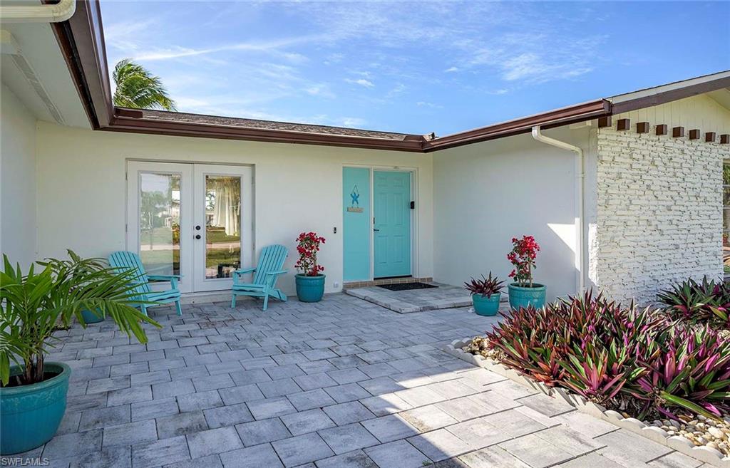 Nestled in the highly sought-after Yacht Club Area of Cape Coral, this beautifully updated waterfront home offers the perfect blend of classic Florida charm and modern comfort. Built in 1965 and situated on a desirable sailboat access canal with direct Gulf access and no bridges, this property is a boater's dream and an exceptional opportunity to enjoy the Southwest Florida lifestyle.

Inside, you'll find a thoughtfully updated interior featuring 2 spacious bedrooms and 2 beautifully remodeled bathrooms. The upgraded kitchen boasts modern finishes, ample cabinetry, and a functional layout that's perfect for both everyday living and entertaining. Updated flooring throughout the home creates a fresh, cohesive look while complementing the home's timeless character.

Step outside to your private tropical retreat where an electrically heated swimming pool invites year-round enjoyment. Whether you're relaxing poolside, hosting family and friends, or setting out on the water from your backyard, this home offers everything you need to embrace true waterfront living.

Four minute walk to Tiki Bars, Restaurants and Shopping or just an easy bike ride to Cape Coral’s vibrant downtown area and the revitalized Yacht Club Beach. If you enjoy tranquility, but being in the center of great amenities, you have come to the right place. This property places you in one of the city's most desirable neighborhoods. Whether you're searching for a full-time residence, seasonal getaway, or investment opportunity, this move-in-ready home is an outstanding choice in a premier location.