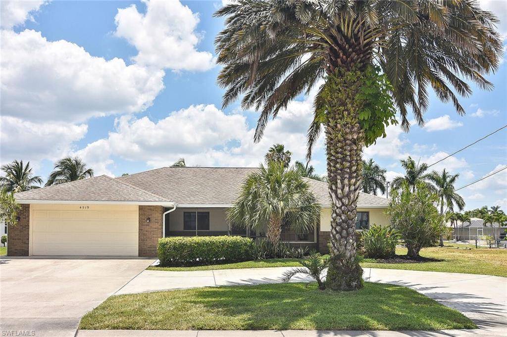 Beautiful Remodeled Gulf Access Pool Home in the desirable Pelican neighborhood. This 4 bedroom, 3 full bathroom with 2100 square ft living area. Open floor plan with great entertaining space. Big eat in kitchen with granite countertops with stainless steel appliances. Relax by the wood burning fireplace in the 23X15 family room. Enjoy the Florida weather outside in your 15X30 pool with upgraded glass tile, bench air jets, brick paver deck, new pool pump 5/2021. New A/C 2020 The inviting large lanai has cable tv lines & plumbed for future wet bar. Circular driveway for ample parking. Enjoy a day out on the water just 2 bridges to the river & Gulf of Mexico. Mature palms trees swaying in the wind making this a true oasis! Includes lawn irrigation system, pool child safety fence. Sidewalks to the sports park.