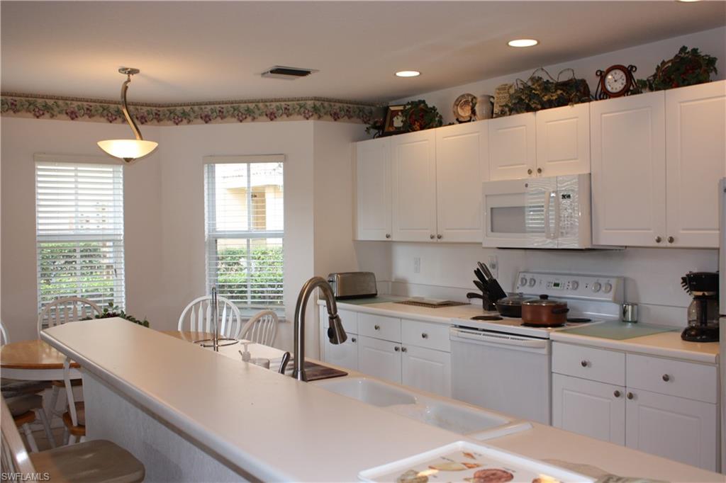 CARRIAGE HOMES AT WOODS EDGE - Residential
