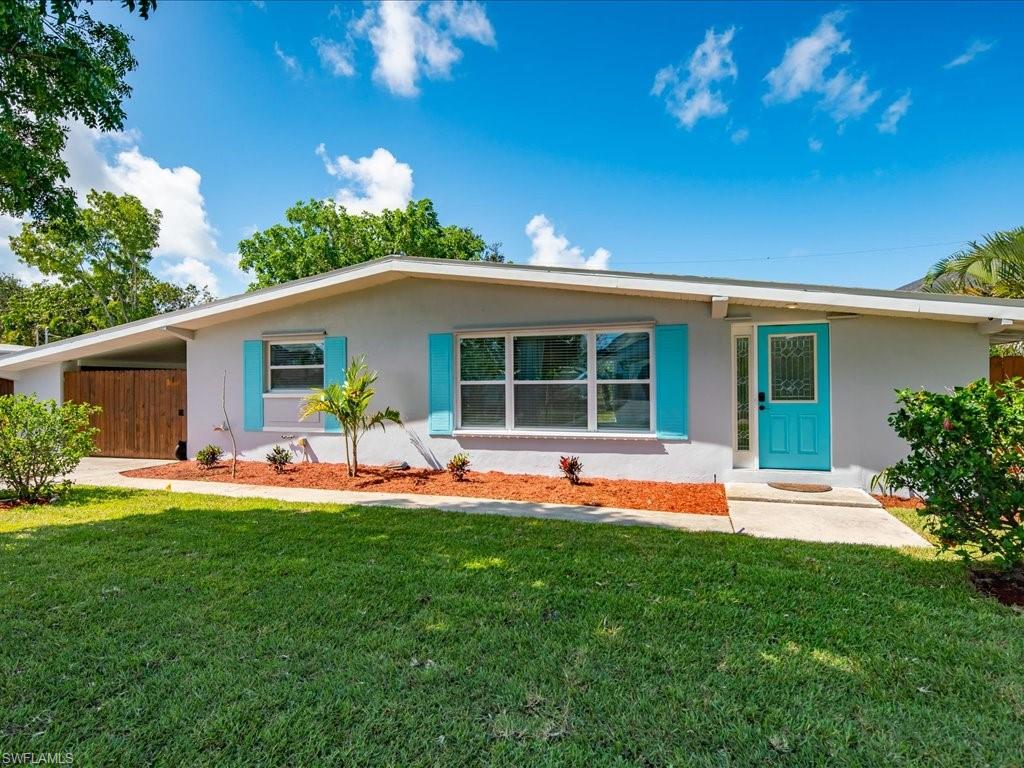 Great opportunity to live close to the beach in a perfectly located neighborhood just minutes from everything! This home was NOT effected by the hurricane!NO HOA FEES! No restrictions! Modernized and updated with Brand New Stainless Appliances in the kitchen, new countertops, new cabinets, and huge new kitchen island w/storage, New floors, new paint interior and exterior, updated bathrooms, metal roof, new landscaping, sod, and irrigation, and a FULLY fenced in backyard! Oversized lot with room to add a pool!Deeded Boat Ramp Access gives you extra value where you can launch your vessel around the corner on 3rd Street. You can be in the Gulf in less than 10 minutes. Property is located in COLLIER County. Attached carport parking with 2+ spots and an oversized driveway perfect to park your toys! No rental restrictions either! What a find! Start living the Southwest Florida lifestyle and make this house your piece of paradise!