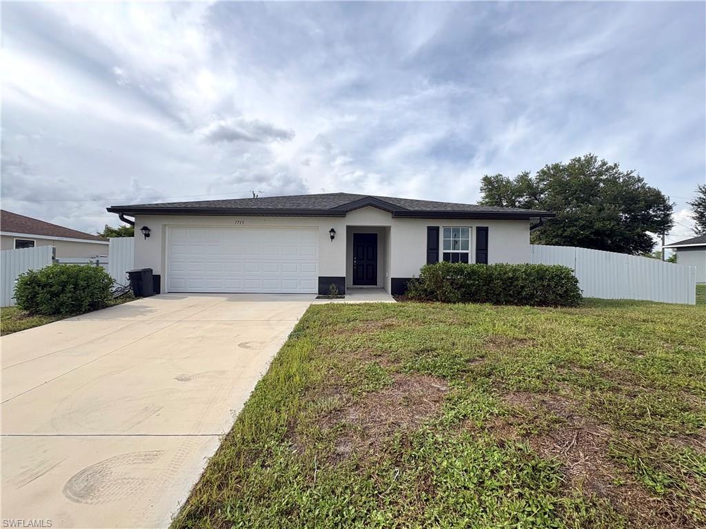 Nearly-new 2023 construction with no HOA fees or restrictions! This immaculate concrete-block home features 4 bedrooms, 2 bathrooms, and a bright, open-concept design perfect for modern living. The heart of the home boasts a sleek kitchen with a spacious breakfast bar that flows seamlessly into the dining and great room. Retreat to the private primary suite with a large walk-in closet, while three guest bedrooms offer excellent versatility for family, guests, or a home office. Step outside to your cleared, oversized quarter-acre lot (80x125)—a completely blank canvas with ample room to design your dream custom pool! Tucked away in a quiet, highly desirable pocket of Northeast Cape Coral, you are just minutes from shopping, schools, dining, and outdoor recreation like Yellow Fever Creek Preserve. Skip the construction wait times and start living your Florida lifestyle today!