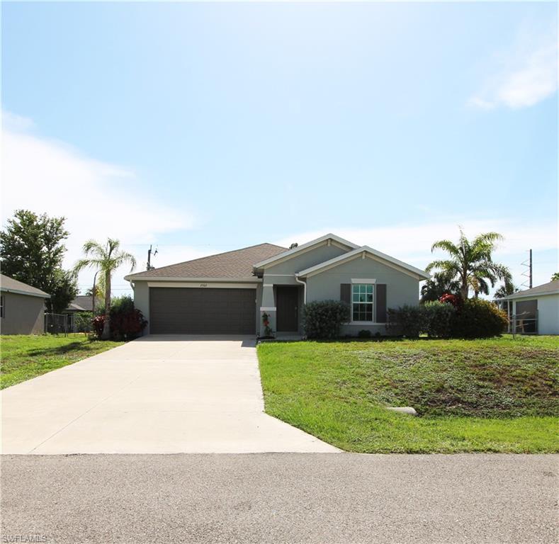 One or more photo(s) has been virtually staged, AI generated or rendered.  Welcome to this beautifully upgraded, nearly new single-story home that perfectly blends modern style with comfortable living in Southwest Florida. Designed with an open-concept layout, the spacious family room, dining area, and kitchen flow seamlessly together, creating the ideal space for entertaining and everyday life. The kitchen features an oversized center island, stylish backsplash, and thoughtful finishes that elevate the space beyond builder grade. There is no shortage of storage in this home, offering a large coat closet at the entry, linen closets in each bathroom and generous closets in each guest bedroom.

The private owner's suite offers a relaxing retreat with a spacious walk-in closet and an en-suite bath featuring dual vanities and a walk-in shower.

This home has been meticulously maintained & improved with numerous high-quality upgrades, including a newly added rear patio, luxury laminate wood flooring, custom wood wainscoting in the hallway and kitchen island, fresh interior paint, updated ceiling and exhaust fans, modern light fixtures, upgraded faucets, garbage disposal, drains, shower head, TV mounts, window treatments, and much more.

Move-in ready and thoughtfully improved throughout, this home offers the perfect combination of style, function, and value. The last four photos have been virtually staged to showcase the home's design potential and inspire future décor ideas.