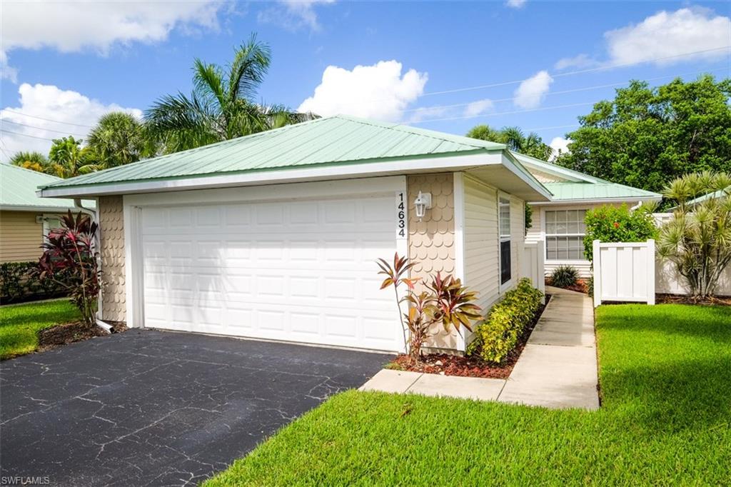 Cute 2/2 + Den with 2 car garage in Gulf Harbour's "Key West" neighborhood of Sagamore Village.  This charmer has a brand new A/C unit (inside and out)  and new laminate flooring in the living room.  Cathedral ceilings make this home feel bright and roomy.  Hot tub on outdoor patio only 3 years old and beautiful metal roof put on in 2013.  Nice quiet neighborhood of only 29 homes. Being offered turnkey.
(Private memberships available).