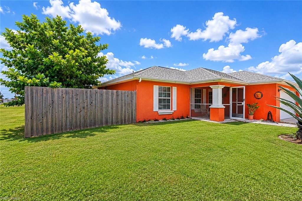 A beautiful and well-located home in the heart of Cape Coral! NOT IN FLOOD ZONE!!! Situated on the centrally located Diplomat Parkway just minutes from Del Prado Boulevard, this property offers convenient access to top-rated schools, shopping centers, restaurants, and other everyday amenities. This home features 1,454 square feet of living space, comprising 3 bedrooms, 2 bathrooms, and a "Den" that can serve as a home office, playroom, or guest space. The open-concept floor plan is highlighted by an impressive, oversized island topped with black marble perfect for entertaining guests and hosting family gatherings. The kitchen is equipped with stainless steel appliances and elegant porcelain tile flooring extends throughout the entire home, creating a modern and cohesive aesthetic. Recent upgrades include a new air conditioning system and a new roof,
both installed in 2023, offering complete peace of mind for years to come. The spacious Lanay features a large, convenient kitchen ideal for daily use, while the big backyard still retaining plenty of space for outdoor living. This property is already connected to the municipal water supply, seamlessly blending comfort, style, and accessibility. Whether you are looking for a primary residence, a seasonal home, or an investment opportunity, this move-in-ready house is a must-see!