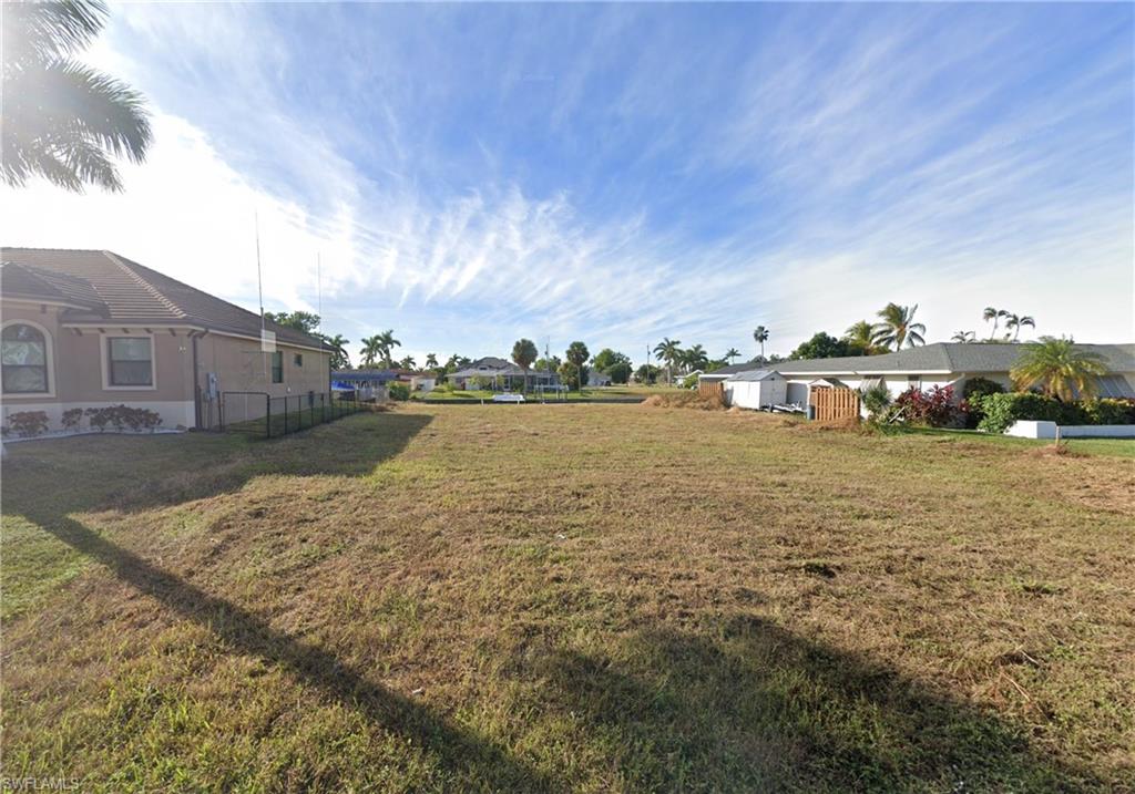 Cleared direct gulf-access waterfront lot in the Yacht Club area of Cape Coral! No bridges! The previous home has been demolished and the land is cleared, offering a clean slate for new construction. Excellent opportunity for a custom waterfront residence, spec build, or long-term investment. Ideal for boaters with bridge-free Gulf access. Less than 5 minutes to the river! Conveniently located just one minute from the Cape Coral Yacht Club, 5 minutes to the bridge to Fort Myers, close to shopping, dining, marinas, and parks. Make an offer and build your dream home in the exclusive Cape Coral Yacht Club!
