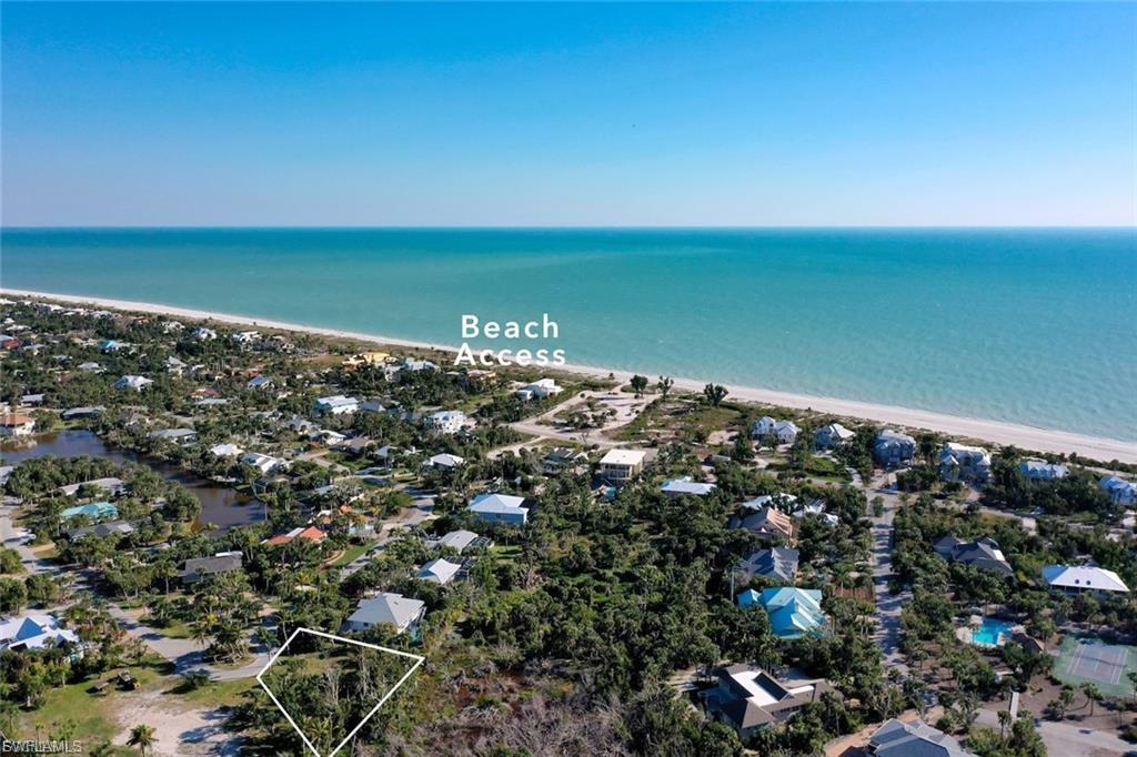 An exceptional near beach parcel with good elevation, that also backs up to preservation land to ensure supreme privacy in perpetuity. This ideal cul-de-sac location is just steps to deeded beach access across from the entrance to this small community off of West Gulf Drive. This parcel is also altered land which allows for greater development coverage. The measured sq fg is 14,095 sq ft. Owners can build to suit.