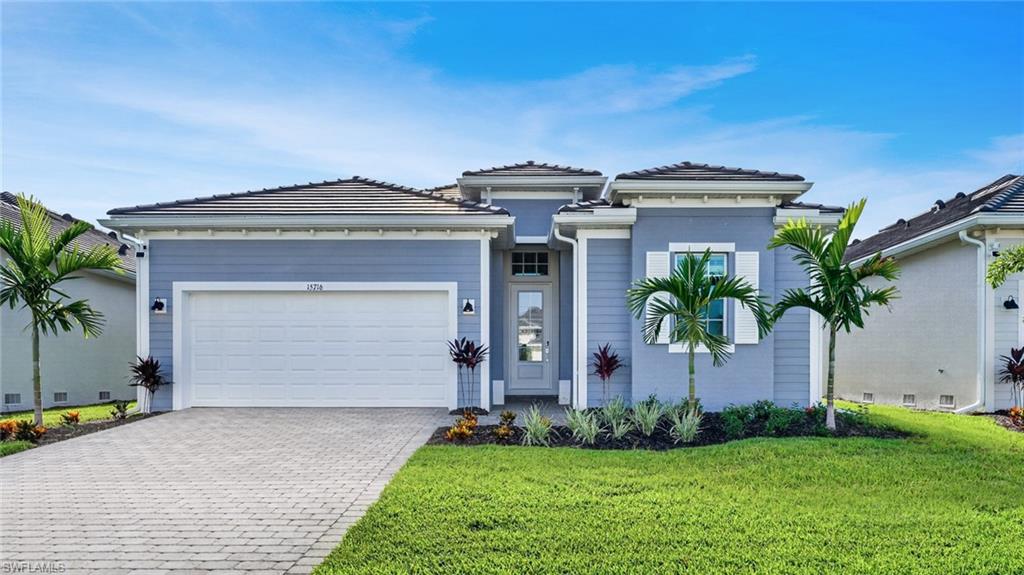 MOVE-IN READY!! Pool included! Step inside this stunning home just six miles from Sanibel Island offering 2,247 square foot home and discover a thoughtfully designed layout that blends comfort and style. The open-concept kitchen is a chef’s dream, featuring quartz countertops, a smooth cooktop with vent hood, all-new stainless steel appliances and designer cabinetry. Entertain with ease as the kitchen flows seamlessly into the spacious family and dining rooms, all illuminated by LED recessed lighting and dressed with 2" designer window blinds. Enjoy indoor-outdoor living with direct access to a covered lanai and an aluminum screen patio enclosure. Near the entry, a flexible den offers the perfect spot for a home office or gym, while a secondary suite provides privacy for guests. The owner’s suite is tucked away at the back of the home, boasting a walk-in shower with clear glass enclosure and elegant designer finishes. Energy-efficient features like a Ring Video Doorbell Pro, smart front door lock and Honeywell Home T6 Pro Wifi thermostat ensure comfort and security. With a hurricane-rated 2-car garage, keyless entry pad and quality concrete block construction, this home is built to last. Homes with this level of design and detail are in high demand—schedule your tour before it’s gone! Prices, dimensions and features may vary and are subject to change. Photos are for illustrative purposes only