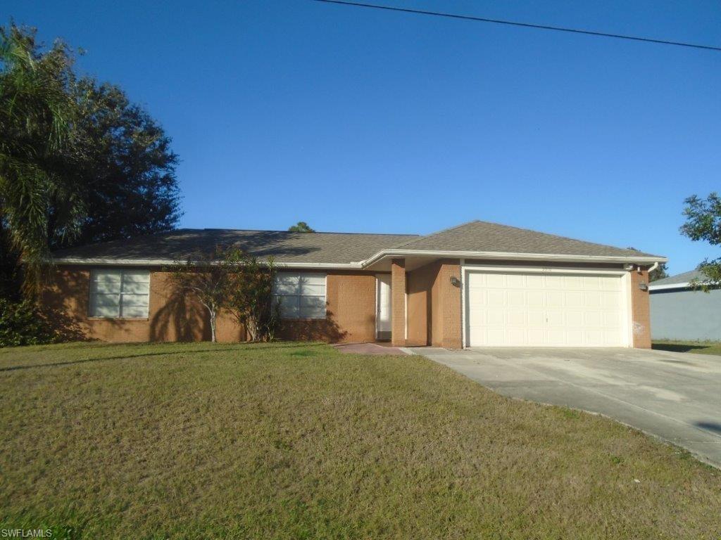Great POOL home located close to everything in Lehigh Acres (off of Sunshine!) LAWN service AND POOL service included in the rent price of $2300!!  Beautiful wood floors in the living room and tile thru out! Large lanai and pool area and great for pool parties and family events!