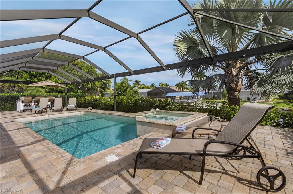 This is a VACATION RENTAL only. Owners will not consider annual rentals. Weekly rentals are welcome.
Villa Barbara is a 3-bedroom, 2.5-bathroom property on a direct gulf access canal (6 minutes/.5 miles by boat) with an electric heated pool and spa. This home sleeps a maximum of 6 guests (including children) and is not pet friendly. Please note that the boat lift is NOT available for guest use.

· · · · · PROPERTY PERKS · · · · ·
- Bicycles
- High chair
- Direct gulf access (6 minutes/.5 miles by boat to open water)
- Fire pit

· · · · · LOCATION · · · · ·
- Located in Southwest Cape Coral
- Close to Rotary Park
- Close to Four Freedoms Park
- A short drive to Cape Coral Bridge, which leads you to Fort Myers/Fort Myers Beach
- Close to "downtown" Cape Coral with locally owned shops, bars and restaurants

· · · · · LIVING AREAS · · · · ·
- Flat-screen TV
- Comfortable seating

· · · · · KITCHEN & DINING · · · · ·
- Fully equipped
- Dining area with seating for 6
- Additional room for 4 at the breakfast bar in the kitchen

· · · · · BEDROOMS · · · · ·
- Primary Bedroom: King bed, sliders to the pool & flat-screen TV
- 2 Guest Bedrooms: 1st has a King bed & flat-screen TV, the 2nd has a King bed, sliders to the pool & flat-screen TV. Both bedrooms share the Jack-and-Jill style bathroom

· · · · · BATHROOMS · · · · ·
- Primary Bathroom: Soaking tub, oversized walkthrough shower & two sinks
- Guest Bathroom: Shower & dual-sink vanity & is between both guest bedrooms
- Half Bathroom: Accessed from the lanai

· · · · · OUTDOOR LIVING · · · · ·
- Electric heated pool & spa
- Eastern pool exposure
- Bar area with room for 4
- Sun loungers
- Grill
- Propane heater
- Propane fire pit
- Hammock
- Boat dock with seating (boat lift is NOT available for guest use)

· · · · · THIS HOUSE IS GREAT FOR · · · · ·
Avid boaters looking for quick access to open water and a modern, spacious property