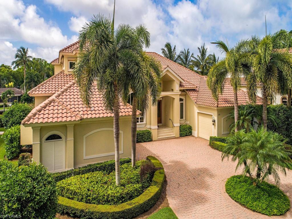 H.15511 Southern exposure, custom built home with over 4700 sq ft of living space in coveted Aqualane Shores. Sure to please avid boaters is the cut-in boat slip with lift, long dock with compost decking and quick direct access to Naples Bay and the pristine waters of The Gulf of Mexico. This split plan home features 4 en suite bedrooms and 5 full baths. The spacious 1st floor master suite features water views, lux bath with jet tub and walk-in shower. Two walk-in closets and spacious dressing table complete this master oasis. Island kitchen with gas cooktop, fine quality cabinets and informal eating space with bay window opens to the family room with fireplace and corner sliders that open onto the spacious paver lanai with large pool / spa overlooking expansive canal. Additionally, the home features comfortable, library with built-ins, formal living room with fireplace, open dining room and wet bar.
Ride the elevator to the second floor featuring loft/media room, 2 bedrooms, 2 baths and a covered observation deck.
Many special touches include marble floors, crown moldings, high ceilings and many built-ins.  Meticulous landscaping, circle drive and split 3 car garage.