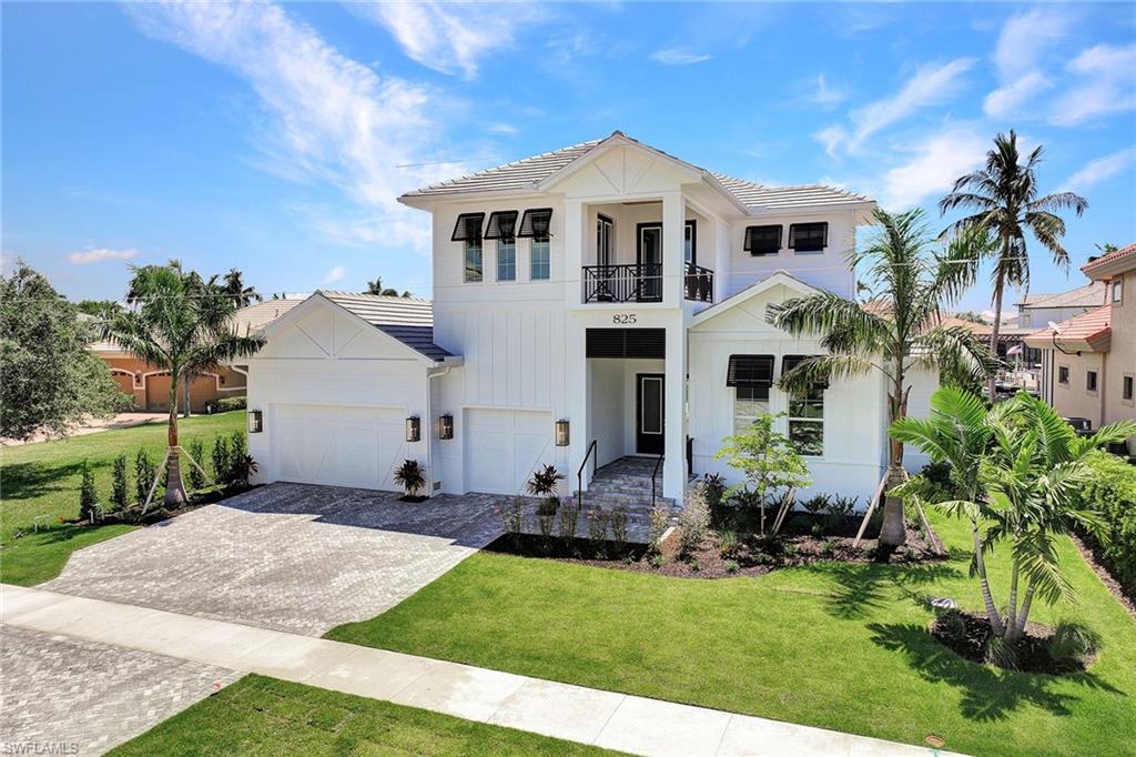 This brand new coastal-inspired custom home is just moments from the beautiful crescent-shaped beaches of Marco Island. On an oversized and direct, quick gulf-access lot, this beautiful 3,800-square-foot home features four bedrooms, four full baths, two half baths, oversized three-car garage, office and a loft with endless amounts of upgrades. Upgrades include Wolf gas range and hood, Asko dishwasher, Dacor refrigerator, under-counter wine refrigerator, porcelain wood-look tile throughout the main areas and bedrooms, high-end quartz countertops, porcelain farm sink, outdoor kitchen and saltwater pool. The home is fully hurricane protected with impact glass, pre-wired for generator with 500-gallon buried propane tank and pre-wired for roll-down screens under the covered lanai. A new seawall was just completed in 2022 prior to the start of construction. This is a premier location for beachgoers, boaters and nature enthusiasts alike.