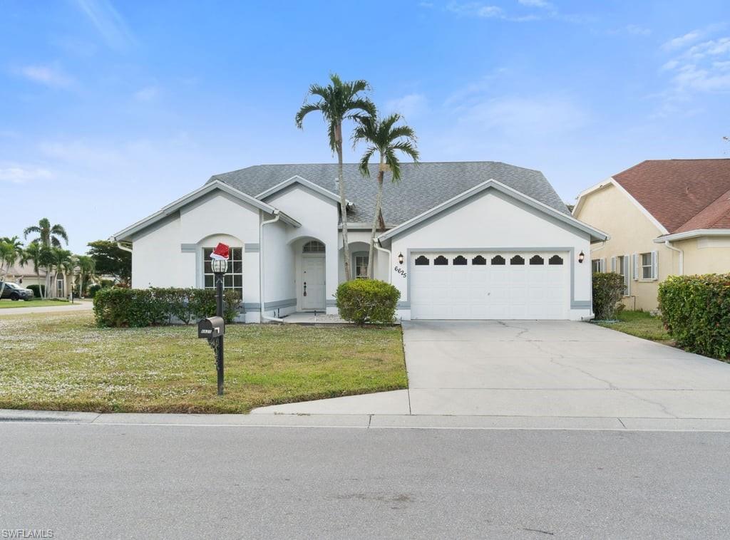 Located in the highly sought-after community of Berkshire Lakes in beautiful Naples, FL, this stunning 3-bedroom, 2-bathroom pool home offers 1,681 square feet of exceptional living space. Situated on a desirable corner lot, the property features a 2-car garage and a thoughtful design perfect for both relaxation and entertainment. The spacious primary bedroom includes a walk-in closet and a split bathroom that conveniently doubles as a pool bath. The kitchen is complete with a pantry, a functional center island, and a separate peninsula that overlooks the living room and pool area. Step outside to enjoy your private pool, where you can soak up the Florida sunshine or host gatherings with friends and family. Berkshire Lakes residents enjoy low HOA fees while having access to excellent community amenities, including a clubhouse, community pool, tennis courts, and a walking/bike path surrounding the scenic lake. Conveniently close to Naples’ best restaurants, shops, and more, this home truly offers the perfect combination of comfort, convenience, and lifestyle. Make this dream home yours today!