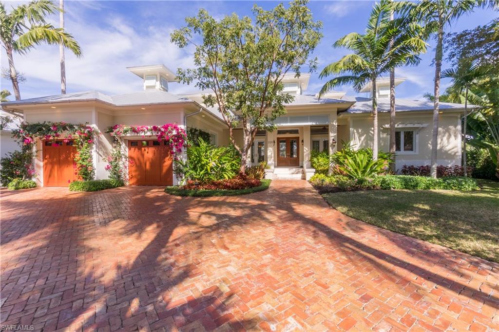 Stunning, custom built home on merging water canals.  Great room with open kitchen, dining room, living room 
and family room with views out to the pool, spa and  intersecting canals.  This home comes turnkey,  filled the highest quality of appliances, furniture, fixtures and furnishings throughout - the home is move in ready !  Entertain inside the home in your gourmet kitchen, or pool side at your outside grill,  or under your resort style chickee hut with its own kitchen facilities. It has an expansive 150'dock and a 12,000lb boat lift.  The professionally landscaped, manicured grounds must been seen to be appreciated.  There are too many details in this house to describe.  Please call for appointment to view this extraordinary property.