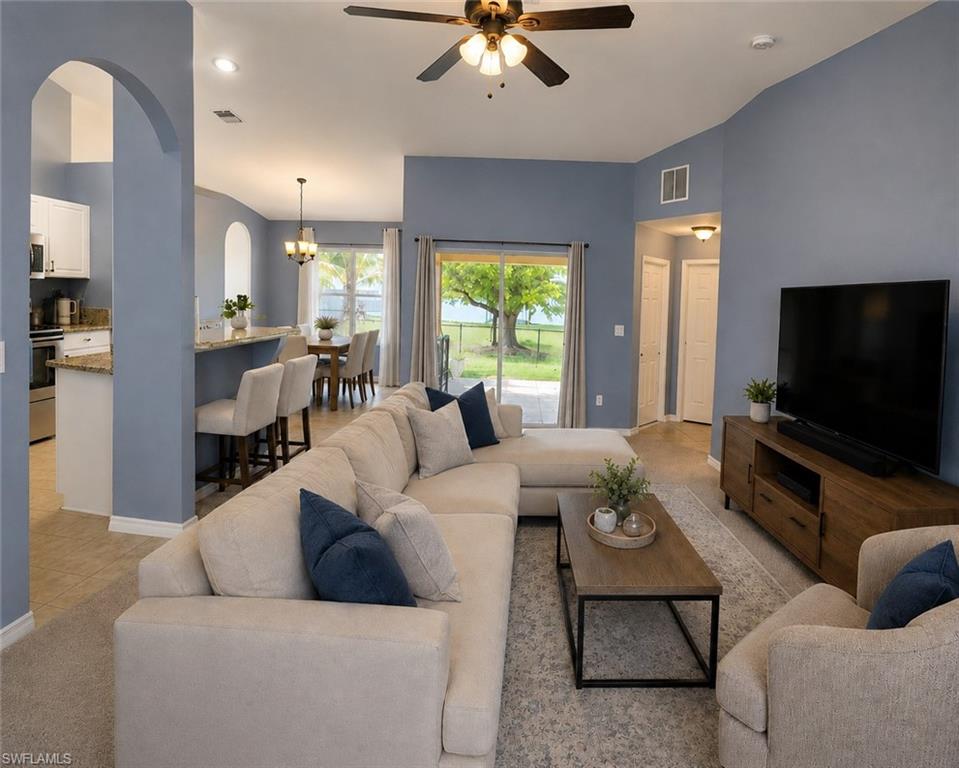 Move-in Ready? Check. Natural light? Check. So much of it - your plants might start paying rent! Backyard? Fenced in and ready to host your friends and neighbors. 2026 HVAC? Check. Boxes to unpack? That's on you. Fresh paint? Inside and out. Because first impressions matter. Storm Protection? It's a breeze with updated accordion shutters. Appliances? Stainless steel. Looking sharp and ready to work. Sprinkler system? Keeping the lawn looking its best. Split floor plan? Great for guests, family, or anyone who appreciates a little privacy. Guest room? More like a guest suite. The attached bathroom and walk-in closet give visitors a little extra privacy and comfort. Vaulted ceilings? Absolutely. Giving the living space an open, airy feel. Location? Right where you want to be. Close to shopping, dining, schools, and everyday conveniences, with easy access to everything Cape Coral has to offer. Some photos have been digitally enhanced and virtually staged. The house is real—the only thing missing is you. Move-in ready with immediate occupancy available.