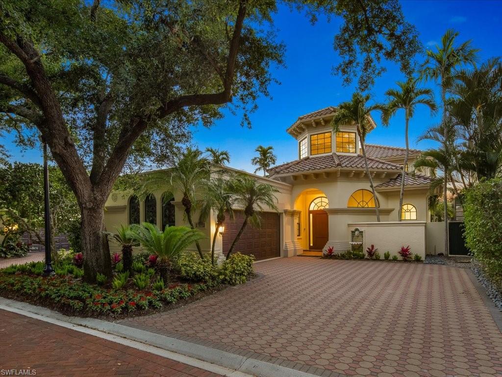 Discover a rare opportunity in the prestigious Vizcaya community within Bay Colony with this exceptional home at 7855 Vizcaya Way. This completely remodeled three-bedroom plus den residence offers a seamless blend of luxury and comfort with its timeless design and meticulous attention to detail. The home features bespoke cabinets and carefully selected finishes that exude elegance and sophistication. The interior is matched by equally impressive views; the property overlooks a pristine lake, ensuring endless vistas of breathtaking sunsets. The scenic surroundings provide a tranquil backdrop for relaxation and entertainment. Residents of Bay Colony enjoy exclusive access to a range of amenities that enhance the luxurious coastal lifestyle. This includes the private Bay Colony Beach Club, located along three miles of immaculate beach. Here, residents can indulge in a variety of fine dining options, from casual beachside fare to upscale culinary experiences. Additional amenities include attended beach services, premier tennis clubs, and a state-of-the-art fitness center. Living in Bay Colony not only means residing in an exquisite home but also enjoying a vibrant community with access to the best in leisure and recreational activities, all within the gates of a secure and beautifully maintained environment.
