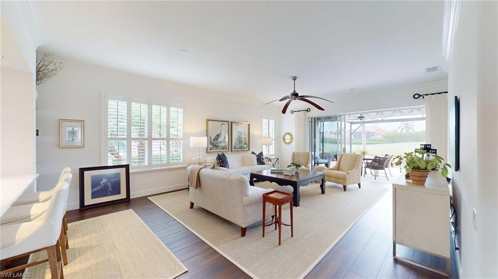 This beautifully updated single-family "Augusta" home in the Golf Village at Lexington Country Club offers luxury living with golf course views overlooking the 17th fairway. Featuring 2 bedrooms plus a formal dining room (converted from the original third bedroom) and 2 beautifully remodeled bathrooms, this home showcases high-end finishes and exceptional attention to detail throughout. The spacious kitchen has been completely updated with custom cabinetry, premium countertops, and top-of-the-line Bosch appliances. Both bathrooms have also been tastefully renovated with new cabinets and countertops. The primary suite features a large walk-in doorless shower and dual vanities for a spa-like experience. Additional upgrades include plantation shutters and crown molding throughout, hurricane impact windows in the primary bedroom and kitchen, and an impact-rated front door. The former laundry room has been creatively transformed into a stylish bar area complete with a sink, cabinetry, and wine refrigerator — perfect for entertaining. Outdoor living is truly exceptional with a beautiful pool and hot tub featuring a waterfall, all enclosed within a new pool cage and surrounded by new pavers. Storm Smart shutters provide added peace of mind. Enjoy relaxing evenings and picturesque golf course views from your private outdoor oasis in one of Fort Myers’ most desirable gated communities. Residents of Lexington Country Club enjoy an active, resort-style lifestyle with an 18-hole championship golf course, 12 lighted tennis courts (including dedicated pickleball courts), six heated swimming pools, a fully equipped fitness center with group classes, three bocce courts, a lending library, tiki bar and restaurant, clubhouse dining, a private beach area, and beautifully maintained grounds—all within a gated community with 24-hour security. Ideally located just minutes from beaches, shopping, dining, medical facilities, and Southwest Florida International Airport (RSW), this home offers the perfect combination of luxury, convenience, and vibrant community living. Be sure to view the virtual tour—either enjoy the guided experience or explore each room at your own pace.