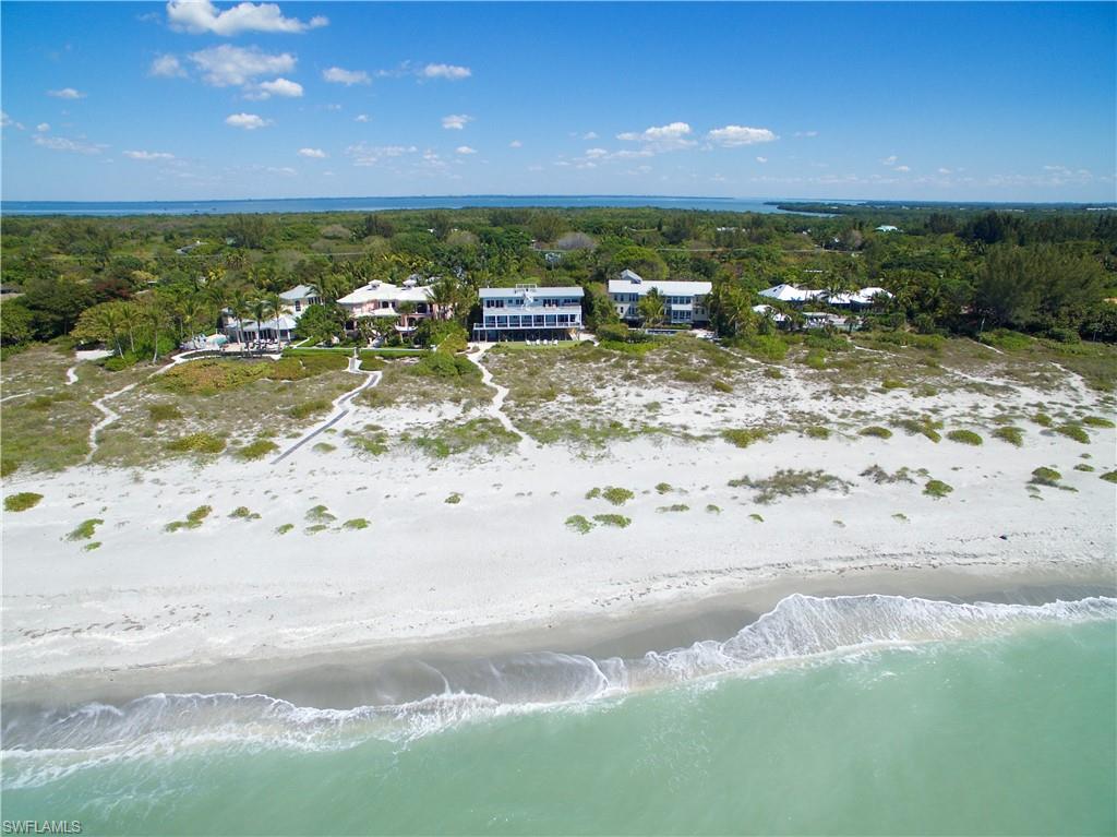 New Latitude is a coastal-modern beach-front estate located on the most exclusive stretch of Captiva's Gold Coast! As an estate-zoned property, with well over an acre of beautiful tropical gardens, it can also have two additional structures to create a private gated estate and enjoy the ultimate experience of island privacy and seclusion. If rental income is of interest, this property is one of the most lucrative on the island. New Latitude boasts nearly $500,000 in income in 2019 alone. The breathtaking water views, the new salt water pool, private en-suite bedrooms, and vast outdoor living spaces keep sophisticated travelers returning time and again. This unique piece of paradise offers 7 bedrooms, 5 of which are en-suites, 4 levels of amazing deck & viewing space areas, multiple family & gathering rooms, elevator, salt water pool and spa.