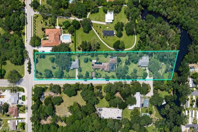 Positioned on an expansive parcel spanning nearly two acres, this prime property presents a remarkable opportunity in the heart of Naples. Located just minutes from the vibrant energy of downtown, the site is zoned RMF-6 and allows for the development of up to 9 single family and 11 multi-family residential units, offering exceptional versatility for developers, investors, and visionaries alike.

Surrounded by a neighborhood experiencing significant growth and transformation, the property is ideally suited for a luxury residential community, a collection of custom homes, or a private estate compound. The existing improvements are being offered at land value, creating an ideal canvas for a new owner to design and build without limitation.

Enjoy the rare advantage of a peaceful setting with water access to Naples Bay while remaining within close reach of the area's most sought-after destinations, including Fifth Avenue South, white-sand Gulf beaches, world-class dining, boutique shopping, and cultural attractions. Opportunities of this size and zoning designation within such close proximity to downtown Naples are increasingly difficult to find, making this a truly exceptional investment in one of Southwest Florida's most coveted markets.