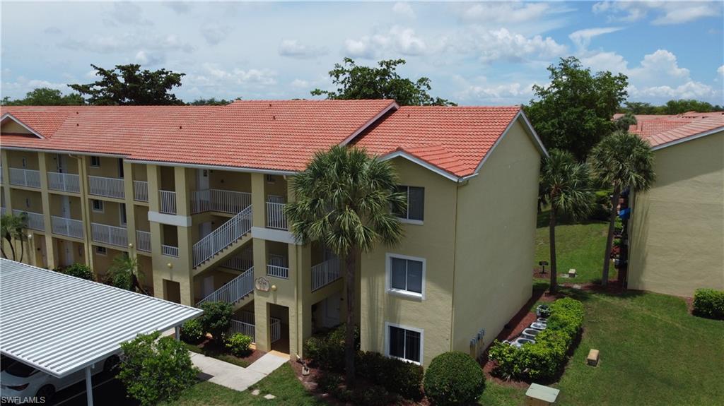 One of the very few genuine three-bedroom residences available in Key Royal — and a top-floor END UNIT at that. While most of this community are two-bedroom floor plans, this rarely offered "Blue Heron" layout delivers a true third bedroom, a split-bedroom design, and 1,330 sq ft of light-filled living just east of I-75 off Immokalee Road in the heart of North Naples. As an end unit on the third floor, it enjoys added privacy, only one shared wall, and no neighbors above — and a vaulted living room ceiling.

Set on a tranquil lake with a lighted fountain, the home's northwest exposure bathes the interior in beautiful evening light and sunset reflections viewed from a screened lanai — one of the finest water views in the community. Tile flooring runs throughout, with a great room, breakfast bar, formal dining, and a kitchen appointed with white cabinetry, granite counters, and a full appliance suite.

The private owners' suite is set well apart from the guest bedrooms, featuring dual closets, and en-suite bath with a jetted tub. Two additional bedrooms and a second full bath deliver the flexibility a two-bedroom simply can't — a dedicated guest suite, a home office, a den, or a hobby room. A full-size in-residence laundry with washer and dryer completes the home, and furnishings are negotiable.

Key Royal is a gated, patrolled community of 270 residences wrapped around two lakes with lighted fountains. Its clubhouse anchors resort-style living: 24-hour fitness center, billiards, game and card rooms, business/computer center, and library, plus a heated pool and spa, poolside tiki-hut bar, BBQ and picnic areas, bike-and-jog paths, dog park, and vehicle wash area. On-site management, trash valet, underground utilities, and lush landscaping keep it effortless. The quarterly fee includes cable, high-speed internet/WiFi, water and sewer, exterior pest control, grounds maintenance, reserves, and security — with public water and sewer and no CDD.

The location is unbeatable: zoned for well-regarded Laurel Oak Elementary, Oakridge Middle, and Gulf Coast High, and minutes from Founders Square, the Shoppes at Pebblebrooke, Logan's Landing, Publix, Aldi, and NCH healthcare. Quick I-75 access puts RSW airport, downtown Naples, and the Gulf beaches (about 8 miles) all within easy reach. Space, privacy, and a premium top-floor lake view rarely come together like this in Key Royal — schedule your private showing today.