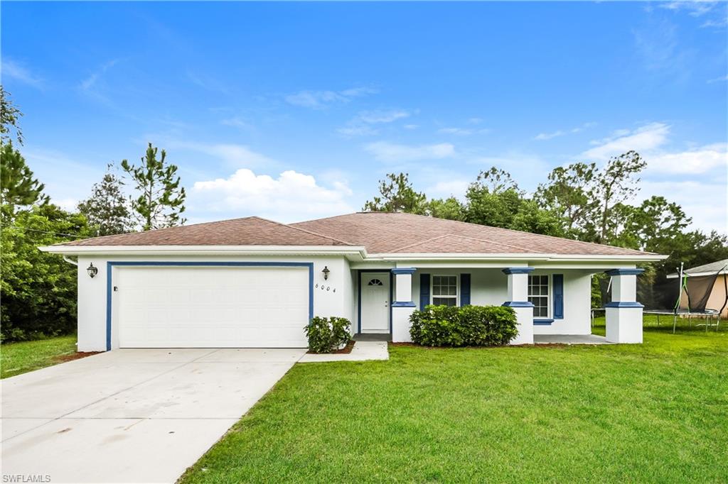Move-in ready home with an open floor plan, vaulted ceilings, and vinyl flooring throughout. The kitchen features ample cabinet and counter space, a breakfast bar, and stainless steel appliances overlooking the main living area. The split-bedroom layout offers added privacy, while the screened-in lanai provides a great space to relax and enjoy the backyard. Conveniently located near shopping, dining, schools, and major roadways. Easy to show!