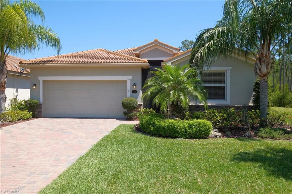 4 bedroom, 3 bath pool home overlooking the lake!The resident Great Blue Heron will welcome you home. Enjoy watching egrets, wood storks, spoonbills, and others  from your lanai, overlooking the lake and preserve, with no homes behind to spoil the view. This home is an upgraded Trevi model with tile on the diagonal in the livings areas and hickory wood floors in all bedrooms, so NO CARPET! Master bedroom with TWO large walk in closets and large shower and garden tub. 4th bedroom has en suite bath, perfect for guests!  Upgraded newer Samsung washer and dryer-steam your clothes clean! The kitchen has granite, 42" cabinets, stainless steel appliances  and a walk in pantry, crown molding throughout, and great storage --this 4 bedroom, 3 bath home is move in ready!

Bella Terra is a community with activities for everyone-community pool, great fitness center, tennis, bocce, sidewalks, and much more. Located near Miromar Outlets, Germain Arena, Coconut Pointe, a great place to live or vacation!