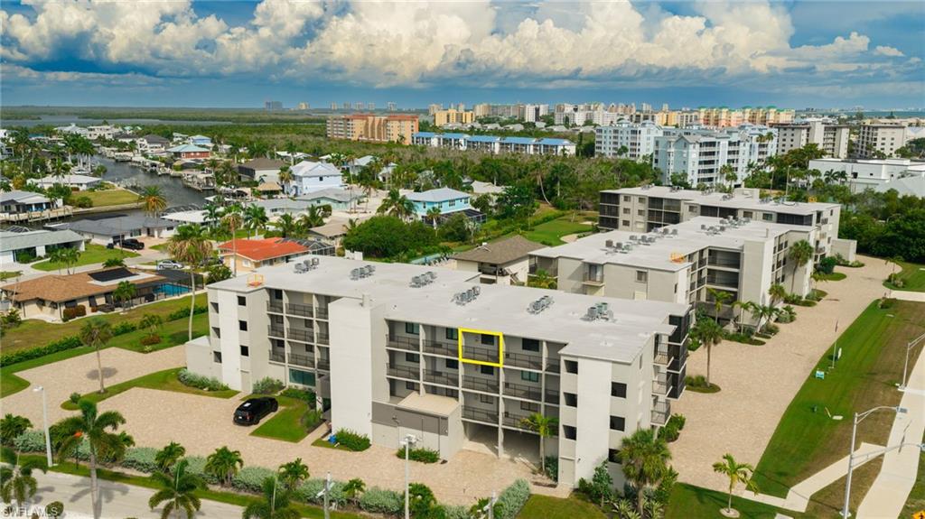 Coastal living begins here! Welcome to Fairview Isles Condominiums, where comfort, convenience, and the island lifestyle come together in this beautifully updated, furnished 2-bedroom, 2-bath residence. Situated on the third living level (above covered parking), this inviting condo offers peaceful landscaped views and a bright, open floor plan designed for easy everyday living or the perfect seasonal escape. The spacious glass-enclosed lanai expands your living space and can be opened to enjoy the refreshing Gulf breezes or closed for year-round comfort. Being offered furnished, this move-in-ready home allows you to begin enjoying Southwest Florida immediately; whether you're looking for a full-time residence, seasonal escape, vacation getaway, or investment opportunity, don't miss the opportunity to see this unit! Located on the highly desirable south end of Fort Myers Beach, Fairview Isles is directly across Estero Boulevard from beach access leading to approximately seven miles of world-famous white sugar sand beaches and breathtaking Gulf sunsets. Spend your mornings walking the shoreline, afternoons relaxing by the community pool, and evenings exploring the nearby restaurants, marinas, shopping, and entertainment that make island living so special. Community amenities include a heated swimming pool, clubhouse, shuffleboard, bocce court, beautifully maintained tropical landscaping, assigned covered parking (#20), and additional storage. Lovers Key State Park, Santini Plaza, boat access, and the Fort Myers Beach trolley are all conveniently nearby, making it easy to experience everything Estero Island has to offer. Whether you're searching for your own beach retreat, seasonal residence, or investment in one of Southwest Florida's most sought-after coastal destinations, this updated, furnished condo offers an exceptional opportunity to embrace the Fort Myers Beach lifestyle.