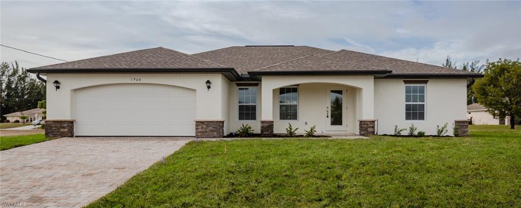 New construction! See our Christopher Alan Homes "St. Augustine" floor plan. Beautiful 4 bedroom, 2 Bath, 3 car garage home in desirable SW Cape Coral. Home comes with a 10 yr structural warranty and a full 1 yr warranty! Features: Open floor plan with cathedral ceilings, Center island kitchen, spacious living room leads to large covered lanai to enjoy the SW Florida lifestyle! CBS constructions, Interior Wood Frame, Under truss lanai, Lennox 14 Seer high efficiency AC system, Dimensional shingles, PGT Low E Insulated windows, wood cabinets with soft close, Granite in kitchen and bathrooms, Stainless steel appliance package, colonial style raised panel doors, Electric garage door opener, 18" tile flooring in main living areas , stone accents on front elevation of the home, 3 zone irrigation system, upgraded landscape package, epoxy coated garage floors. Pictures shown are of a completed home and features may differ. You will not find another new construction home at this price with this quality of construction! Ask sales representative about closing costs incentives.