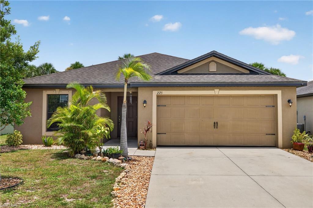 Welcome to **225 Shadow Lakes Drive**, a well-maintained 3-bedroom, 2-bathroom home offering 1,394 square feet of comfortable, single-story living in the gated Shadow Lakes community. Built with durable concrete block construction, the home features the **Tubes in the Wall® system**, delivering targeted, long-lasting in-wall pest control customized for Southwest Florida’s climate and pest-control needs.

The functional split-bedroom floor plan includes a spacious living area with attractive wood-look flooring, a separate dining space and plenty of natural light throughout. The kitchen offers stainless steel appliances, ample cabinetry, generous counter space, a center island and a pantry for additional storage.

The private primary suite includes a large walk-in closet and an en-suite bathroom, while two additional bedrooms and a guest bath provide flexibility for family, visitors or a home office. Additional highlights include an interior laundry room, attached two-car garage and a covered rear lanai overlooking the backyard perfect for relaxing, entertaining or creating your own outdoor retreat.

Shadow Lakes offers gated entry, community parks and a playground, with convenient access to State Road 82, I-75, shopping, dining and Southwest Florida International Airport. This inviting home combines comfort, value and everyday convenience.