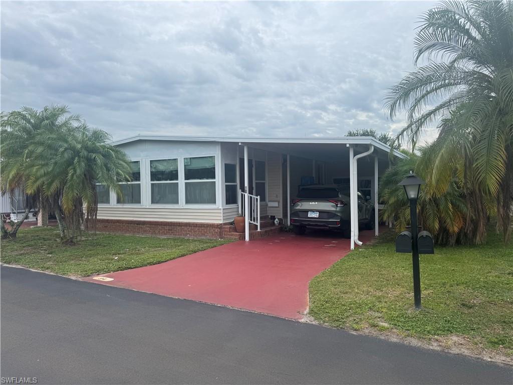 Welcome to this furnished 1980 two-bedroom, two-bath home located in the gated 55+ community of Poinsettia Park in Fort Myers. This move-in ready home offers a comfortable floor plan with a screened and glass-enclosed sunroom, providing additional living space to enjoy year-round.
The covered carport offers space for outdoor seating, while the enclosed utility/storage room includes a washer and dryer and provides ample storage. All furnishings currently in the home will convey with the sale.
Poinsettia Park is a resident-owned cooperative community featuring amenities that include a heated swimming pool, clubhouse, pickleball, shuffleboard, bocce ball, billiards, library, and a variety of planned social activities. The monthly maintenance fee of $257 includes cable television, high-speed internet, lawn care, trash collection, and maintenance of common areas and community amenities.
Conveniently located in the heart of Fort Myers, residents enjoy easy access to shopping, dining, medical facilities, downtown Fort Myers, I-75, golf courses, area beaches, and Southwest Florida International Airport (RSW).
Schedule your private showing today and discover all that this home and community have to offer.