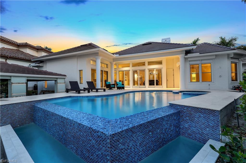 NOW OFFERED AT A GREAT PRICE! Nestled in the prestigious Moorings neighborhood in Naples, FL, welcome to 255 Bay PT offering an unparalleled blend of luxury, serenity & direct Gulf Access right from your back yard. This exquisite property, poised directly on Doctor’s Bay, encapsulates the pinnacle of waterfront living, presenting an opportunity for discerning buyers to own a slice of paradise in one of the most coveted locations in Southwest Florida. As you approach the property, you are presented with a brand new exterior of the home recently painted, brand new garage fixtures, new modern brick paved driveway & all new professional landscaping done to perfection. Inside, the home unfolds in an elegantly designed bright and open layout showcasing the fabulous bay views, featuring 3BD+ Den, 3.5BA, 3-car garage that has been recently epoxied. Natural light floods the interiors, highlighting the open, airy spaces and the seamless flow between indoor and outdoor living areas. The living spaces are designed not just for beauty but for functionality and include volume ceilings, elegant limestone flooring, large kitchen with gas stove, wet bar & gas fireplace. Hurricane impact doors & hurricane shutters also featured. The heart of this magnificent property is, undoubtedly the backyard with its brand-new infinity-edge heated pool & spa, which seems to merge into the azure waters of Doctor's Bay, offering breathtaking views and a tranquil oasis for relaxation or entertaining. The adjacent boat house, a rare find in Naples, promises endless adventures on the water, ensuring direct Gulf access for boating enthusiasts. Brand new decking to be installed by Naples Marine Construction ! The Moorings, renowned for its serene environment offers residents a unique blend of privacy and access to Naples finest beaches, shopping & dining. This property, located within walking distance to the beach, provides an unmatched lifestyle, where days are measured by breathtaking sunsets over the Gulf and leisurely strolls along the sandy shores. 255 Bay Point is more than just a home; it is a retreat, a sanctuary, and a luxurious waterfront estate that promises a lifestyle of unparalleled opulence and tranquility in Naples, Florida. For the discerning buyer, this property represents a rare opportunity to live in one of the most beautiful settings on the Gulf Coast, with the added allure of direct access to the waterways that make this area a boater's paradise. Offered Furnished!