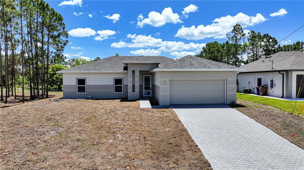 You Will Be Amazed By The Quality Of This Brand New Construction 3 Bedroom (Plus Private Home Office/Den/Or 4th Bedroom With Solid Wood French Doors) 2 Bathroom/2 Car Garage Home With Eastern Exposure For Those Stunning Florida Painted Sunrises, All On An Oversized .42 Acre Lot In Lehigh Acres, FL. This Spacious Home Comes With 1682 SF Under Air And Is COMPLETELY Finished With A Certificate Of Occupancy (CO)! You Can Move Into This Home Today Or Use It As A Cash Flowing Rental Unit (Very High Demand). The Gourmet Island Kitchen Comes With Quartz Countertops, STAINLESS STEEL APPLIANCES, Real White Wood Shaker SOFT TOUCH Cabinet Doors & Drawers, Tile Backsplash, Floor To Ceiling Pantry, Stainless Steel Tub Sink, Modern Lighting, And A Large Breakfast Bar. Other Upgrades Include; FREE BRAND NEW WASHER AND DRYER WITH PURCHASE OF THIS PROPERTY, HURRICANE IMPACT GLASS WINDOWS AND DOORS, Large Designer High Gloss Porcelain Tile Flooring Throughout Entire Home, PAVER DRIVEWAY, High Ceilings, Large Living Room, Upgraded Baseboards, Large Dining Area, Custom Interior/Exterior Two-Tone Paint, Custom Ceiling Fans, Modern Lighting, Large Walk-In Closets, Quartz Countertops In The Bathrooms, Huge Back Yard, New Landscaping Package, Epoxy Coating In The Garage And On The Open Covered Lania, And A Laundry Area Including A New Washer & Dryer Inside Of The Home. This Home Is Very Close To Regional Shopping Malls, SR 82 And Fort Myers, Golf Courses, Interstate I-75, Regional Airport, FGCU, Restaurants, Schools, Golf Courses, MLB Spring Training Baseball, Outdoor Parks, Boat Ramps, Amazing Fishing, And Those White Sand Beaches Of The Gulf Of America! DOWN PAYMENT ASSISTANCE IS AVAILABLE!