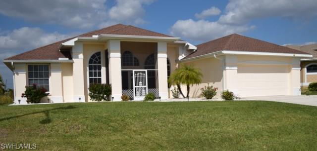 BUYERS FINANCING FELL APART!!!  PERFECT FOR A VACATION RENTAL ALREADY FURNISHED!!! Beautiful Freshwater Canal Pool Home! This spacious 2200+ Sq Ft home offers open great room floor plan with 4 bedrooms, den/office space and 2 baths plus a large screened in lanai area overlooking the canal. This home includes a formal dining, breakfast nook and counter/bar. Plenty of kitchen cabinets with island and newer appliances (2015) along with washer and dryer new in 2013. Other features that sets this home apart from others includes heated pool and outside shower, exterior recently painted, partially furnished, cement dock, vaulted ceilings, tile floors with carpet in all the bedrooms. Walk-in closets, 2nd bath services as pool bath. Master bedroom has sliders leading to the lanai and walk in closets. Master bath includes separate shower and soaking tub. This home was only used as a winter home for the owners. Once you step inside, you will never want to leave!