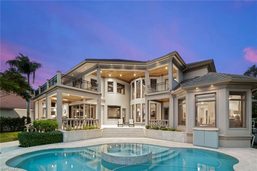 Welcome to one of Fort Myers most stunning riverfront Masterpieces featuring over 6,000 square feet, under air located on nearly half an acre of land and boasting most amazing sunsets in Florida! This mansion immediately impresses by its solid architecture. Once you step through the heavy Cantera iron doors you will be impressed by impeccable craftmanship boasting travertine flooring, elevated tile baseboards, exquisite Venetian plaster, and water panoramas from every angle! The Chef’s kitchen features under-cabinet lighting, top notch appliances, a wet bar with a Turkish ceiling, and lighted onyx countertopst and a wine cellar! The primary suite is accompanied by a sumptuous spa-like bath. 2 balconies offer amazing views of the pool, SPA, and tranquil river ambiance. The 2nd level features an entertainment room, 3 further bedrooms and baths. Enjoy your sundowners in your outdoor kitchen by the fireplace. Further upgrades include a Savant entertainment system throughout the home, a whole home generator, a 10’ elevation, an oversized 3 car garage, Cypress wood ceilings on all outside covered areas and so much more!  Embrace this magnificent riverfront sanctuary, your perfect haven!