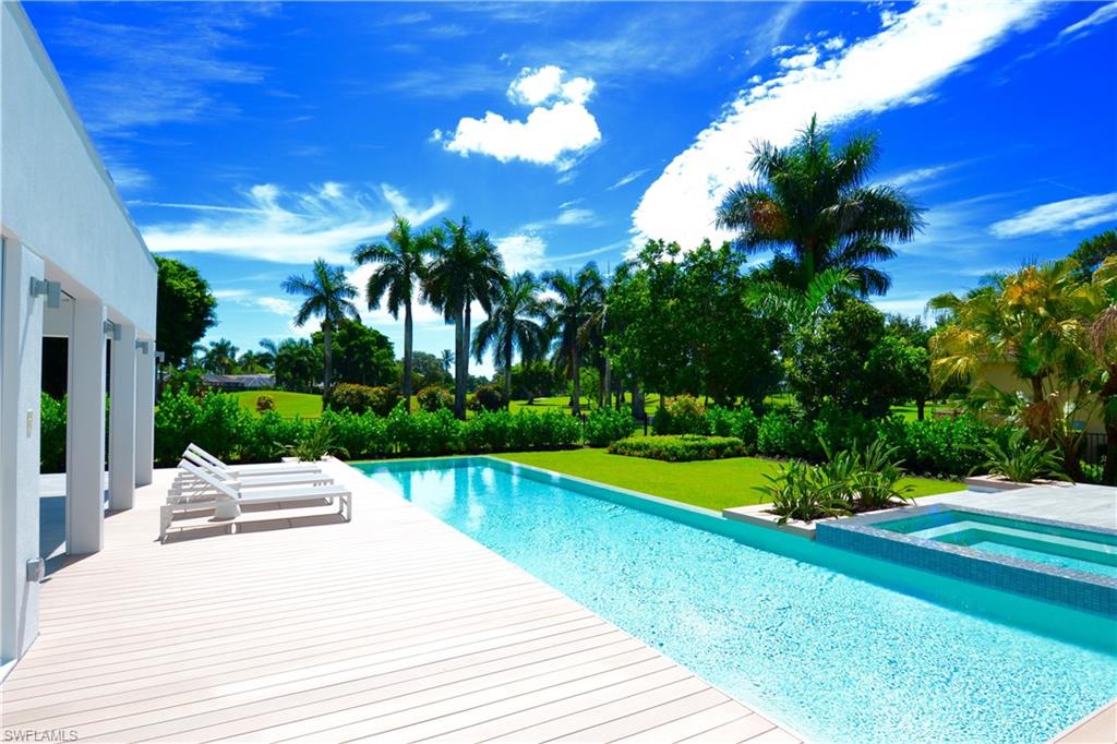 Reflecting a blend of Californian and European design, 2828 Crayton has set a new level of architectural style in Naples offering the latest products from across Europe and attention to every detail by Lime International Decor. Prominently positioned on Crayton Road, the home boasts spectacular panoramic golf course views from its huge two-story walls of glass bringing the outside tropical paradise in. The southern and eastern exposure of the 44-foot double infinity-edge lap pool, spa and deck captures all-day sunshine. Relax in the covered outdoor living and dining area, with television, electric screens and a gas fireplace for those cooler evenings. Friends and family will enjoy sunsets from the third-floor 420-square-foot rooftop sky lounge with 360-degree views across the bay toward the Gulf. Have it all. Close to beaches, minutes to downtown, golf course views and a cutting-edge design.