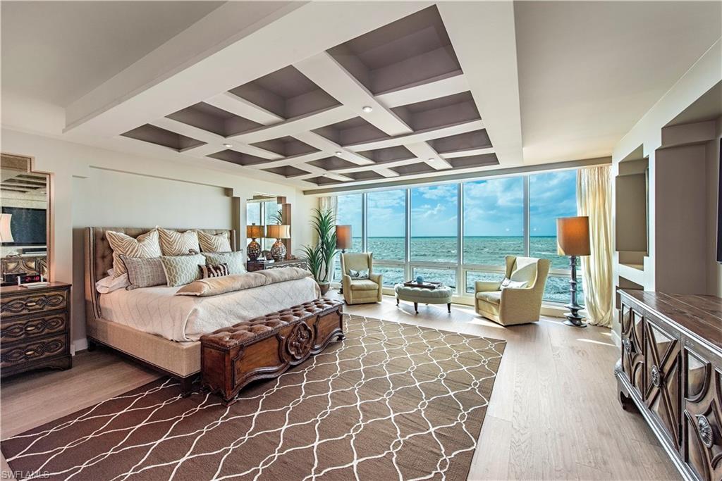 Stunning sunsets are just the beginning. Every architectural detail has been attended to with a meticulous eye, creating an experience from the moment you step off your private elevator to the moment you retire for the evening. The living and dining are infused with warmth and a comfortable elegance that captures the essence of a chic beachfront residence. This 3 bedroom plus office has oak wood floors throughout, a versatile layout for seamless, easy living. Custom ceiling design and generous floor to ceiling walls of glass frame the incredible beach views. Spacious kitchen and butler’s pantry face the white sandy beach and Gulf. The master suite is bathed in natural light from the walls of windows directly on the beach. Master spa bath with dual vanities and custom walk-in closet. Two large en-suites are ready for guests. Unwind from your expansive terrace while taking in the iconic Naples sunsets. 5-Star amenities, private beach club, fitness center, concierge service, and 24-hour staffed security. You have it all when you live at Moraya Bay.