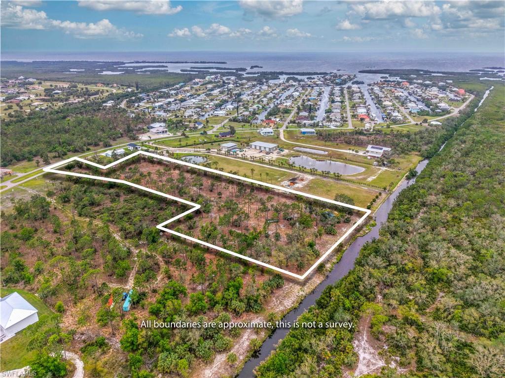 Nestled in the tranquil, laid-back community of pirate harbor, this stunning 6- acre property offers 400 feet of pristine creek- front access. Enjoy the serenity of waterfront living with ample space for your dream home or private retreat. the property is free of wet lands, providing a clear buildable space, and an environmental study has been completed for added peace of mind. with its unique blend of privacy, natural beauty and convenient access to the water this parcel is perfect for those seeking a quiet , nature -filled escape while still being close to all the amenities pirate harbor has to offer. Don't miss the chance to own this one-of-a-kind water front gem. Seller will consider dividing into up to 3 parcels.