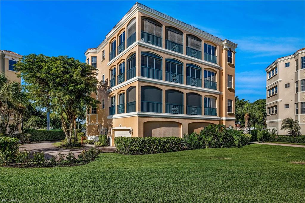 JUST LISTED. TOP FLOOR PENTHOUSE LIVING WITH VIEWS OF THE GOLF COURSE AND LAKE.  Only one unit per floor with direct access to your private foyer from elevator. This top floor unit also comes with an oversized 2 car plus golf cart garage. Features include new washer and dryer, open kitchen and dining wall for floorplan flow, light manufactured wood flooring, updated master bath, newer air conditioner, Hunter Douglas blinds and plantation shutters. The large back lanai and front lanai both have hurricane shutters.The Harbour Landings community features its own community pool and spa. Seller has already done home and mold inspection so ready to go..  Gulf Harbour Yacht and Country Club offers many amenities including deep water marina, recently renovated and redesigned golf course, new fitness center with full service spa, tennis,  clubhouse dining and many walking paths that take you to the marina and grill dining, beach and river views.