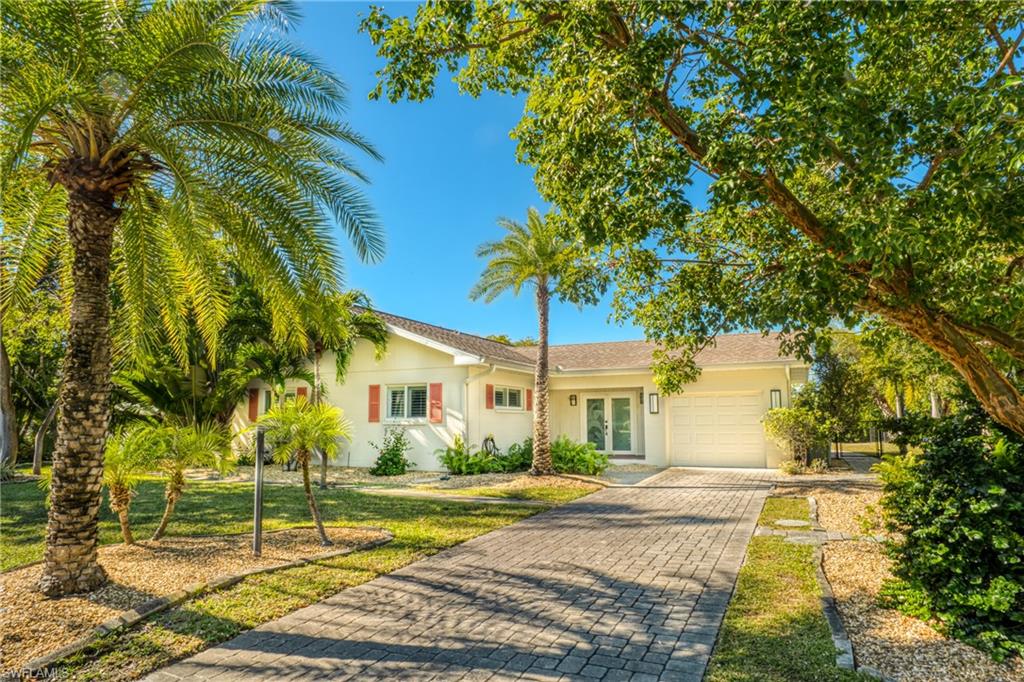 Photography coming soon! Charming 2 bed 2 bath ground level lakefront pool home tucked away in stable, secluded Sanibel Lake Estates neighborhood. Conveniently located mid-island; walking distance to shops and restaurants and a 10 minute bike ride to near by beaches. If you are looking for your full-time or seasonal Sanibel retreat, you have found it.