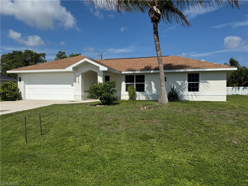 Wow!  Southwest Cape Coral 3/2/2 home with all utility assessments paid!  Convenient south Cape location without the crazy assessment tax bill.  Entire home has been completely updated, including:  New 2025 roof, new tile flooring (entire home), new shaker style soft-close kitchen cabinets with island and granite countertops, all new lighting and remote control fans, new bathroom vanities with granite counters, and newly tiled showers in both bathrooms,   The enclosed and air conditioned lanai can be used as a den, office, or TV room.    Stainless steel appliances in kitchen and washer, dryer, and utility tub in the indoor laundry room.  Outside you'll find a spacious attached garage with a service door and newly painted floor, shelving, ceiling fan, automatic sprinklers, and a large shade tree.  This location can not be beat as it is close to all things South Cape; restaurants, nightlife, shopping, schools, public library, churches, and medical facilities.  Easy access to both the Cape and MidPoint bridges if exiting the Cape, and just minutes to Tarpon Point, Cape Harbour, and the new Bimini Basin development.  This is a terrific central Cape Coral location with utilities installed and paid!  Lock in your financial certainty now and enjoy this completely updated home without stressing over future unknown and outrageous utility assessments and connection fees.  Call to schedule a viewing today!