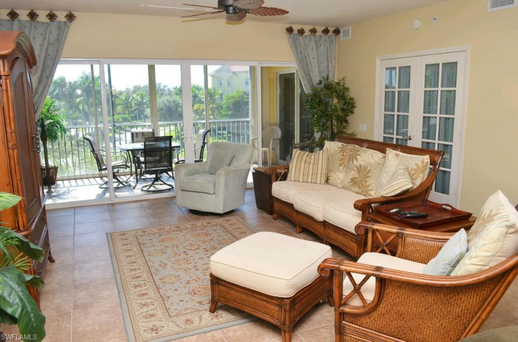 BELLA LAGO 2006 NEWER CONSTRUCTION CORNER 3BD/2BTH RARELY AVAILABLE ON FORT MYERS BEACH!  ONE HOP WALK TO WHITE SANDY BEACH VIA DEEDED BEACH ACCESS. IN BEST BUILDING 5 WITH SOUTHWEST EXPOSURE AND AWAY FROM BUSY ESTERO BLVD !!!Professionally decorated and Furnished Turnkey with Views of Lake, Water Feature And Peak of Gulf of Mexico! The Gourmet Kitchen is Open and Bright, High Ceilings with Tray WITH Crown Moldings. Guest Quarters can be closed to become a Private Suite with a Full Bath. MASTER BATH IS HUGE WITH SPACIOUS ROMAN SHOWER. TILED LANAI with views and Storm Resistant Glass Enclosure to add additional living space in Lanai -terrace !!!  The home is completely Tiled as an Upgrade! ONE Secured parking is under Building, and one Storage room. RESORT AMENITIES INCLUDE: Pool & Spa, Fitness and Social Rooms, BBQ area, Tennis, Walking/Jogging paths in Bay Beach to the Deeded Fishing Pier and is Directly across the street from the Deeded BEACH Access  . Walk to Fish Tale Marina, restaurants, shops, and Boat Slips are available in Bay Beach for Purchase! On the Desirable South End of FT Myers Bch with Quick Exit via South Bridge!UNIVERSAL DESIGN/ACCESSIBLE HOME.