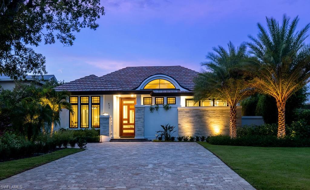 Discover the meaning of luxury living in the heart of Old Naples. This newly constructed residence offered fully furnished, just steps from the sugar sand beach, offers an impressive level of finish and design. The home, designed by renowned architect Jerry De Gennaro, merges both an open and formal concept with wide plank wood floors, custom trim work, and many other refined custom interior features. Built for entertaining, the kitchen includes Sub-Zero and Wolf appliances, and a large custom island and table. An oversized family room, with fireplace, looks out to a sublime tropical retreat that features a large pool and spa. The outdoor living oasis includes  a summer kitchen, an open-air dining area and lounge, and hidden motorized screens. The main level master suite has a private spa view, a spacious master bath finished with natural stone and a private zen garden, and an oversized walk-in closet with custom shelving. On the second level, the generous sized guest rooms have en-suite bathrooms and walk-in closets. Located on one of the most beautiful streets in Old Naples, and just a short stroll from the renowned 5th Avenue South, this home is a must-see!