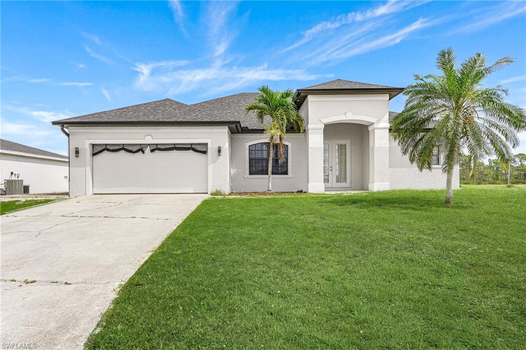 This gorgeous home has over 2000 sq. feet of living space with three large bedrooms, 2 large bathrooms, and screened lanai. The kitchen features stainless steel appliances, pantry, and breakfast bar. The primary suite is spacious with an ensuite bathroom with a large soaking tub, walk in shower and dual sinks. The guest bedroom share a 2nd bathroom offering a shower/tub combo and dual sinks. All rooms have a ceiling fan. There are sliding doors in the living room that lead out to a screened-in porch. This home is pet-friendly (with approval). Owner pays for lawn care and pest control.