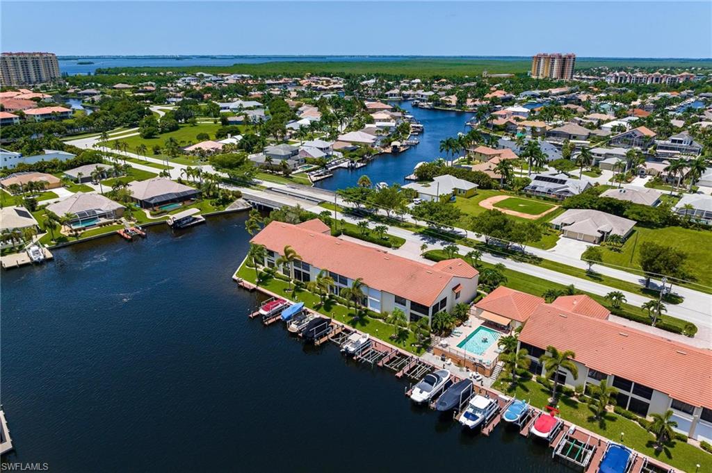 Property has been withdrawn while repairs from Hurricane Ian are completed on the common areas. 
Boaters paradise with spectacular water views!!! Rarely available beautiful 3 Bedroom 2 Bath Gulf Access Condo with boat dock and lift near Tarpon Point. The features of this awesome second floor 55+ condo include an open plan great room design with views out over the canal from the kitchen living room, master and dining areas, 15ft vaulted ceiling in the living room. Enjoy the breeze off the water on your screened lanai with sliders as you watch the dolphins play. The condo has its own assigned boat dock and lift with just one bridge out to the Gulf of Mexico. Capstan Condos are located in a unique location surrounded by million Dollar waterfront homes. Minutes out to the Caloosahatchee River and the Gulf. Spend your day on your boat enjoying Ft Myers, Sanibel, Captiva Beaches and nearby restaurants.